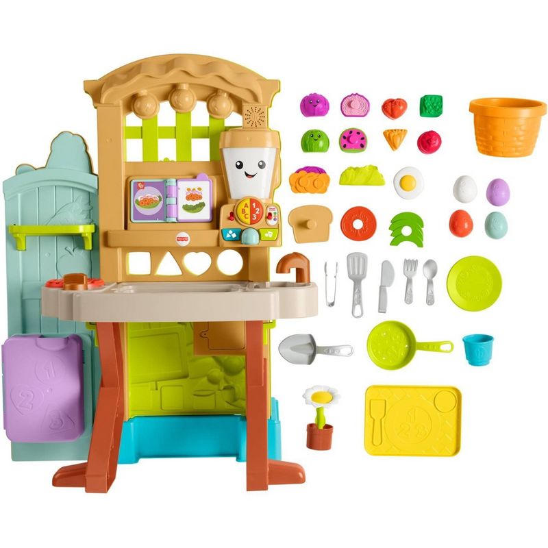 Fisher-Price Laugh & Learn Grow-the-Fun Garden to Kitchen