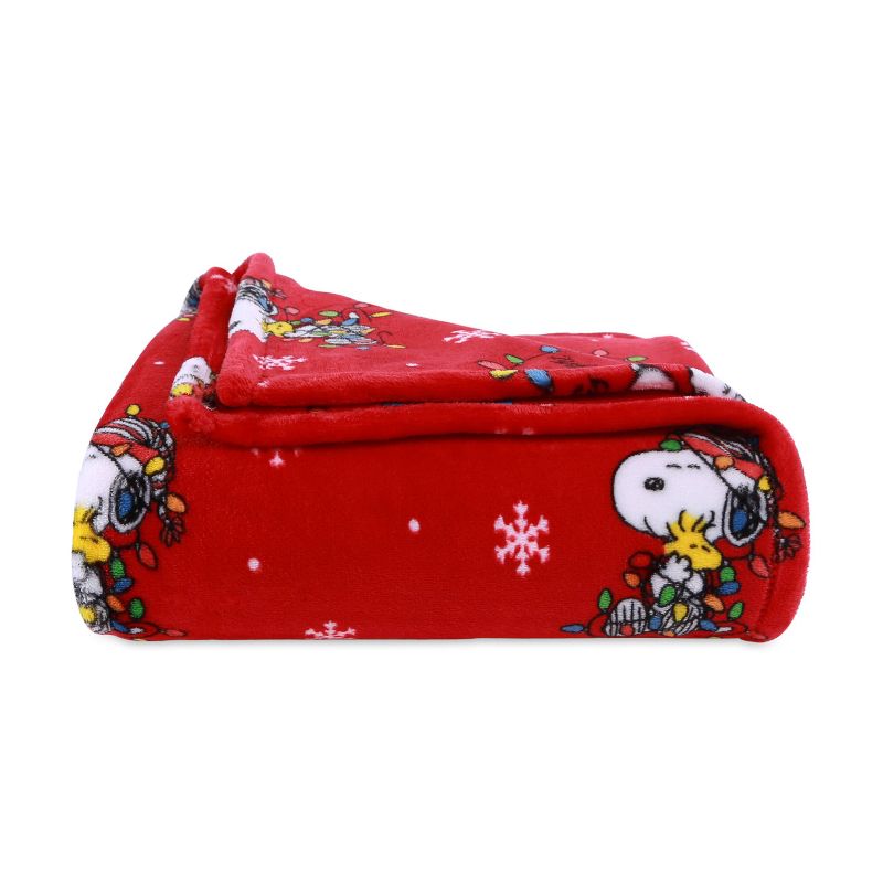 55"x70" Peanuts Christmas Lights Snoopy Loves Christmas Throw Blanket - Better Living