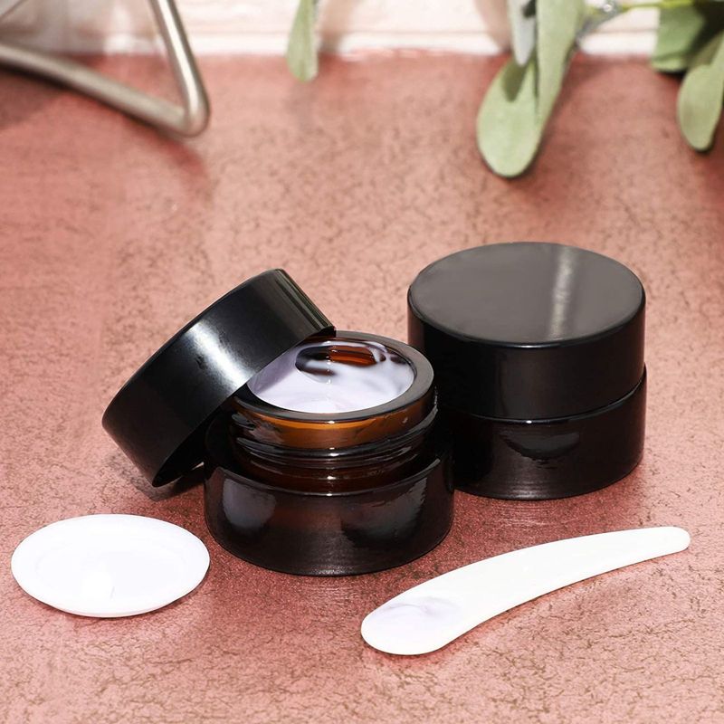 Juvale 24 Pack 5mL Glass Jars with Lids & 6 pc Spatulas for Storing Lotions, Powders, make up & Ointments