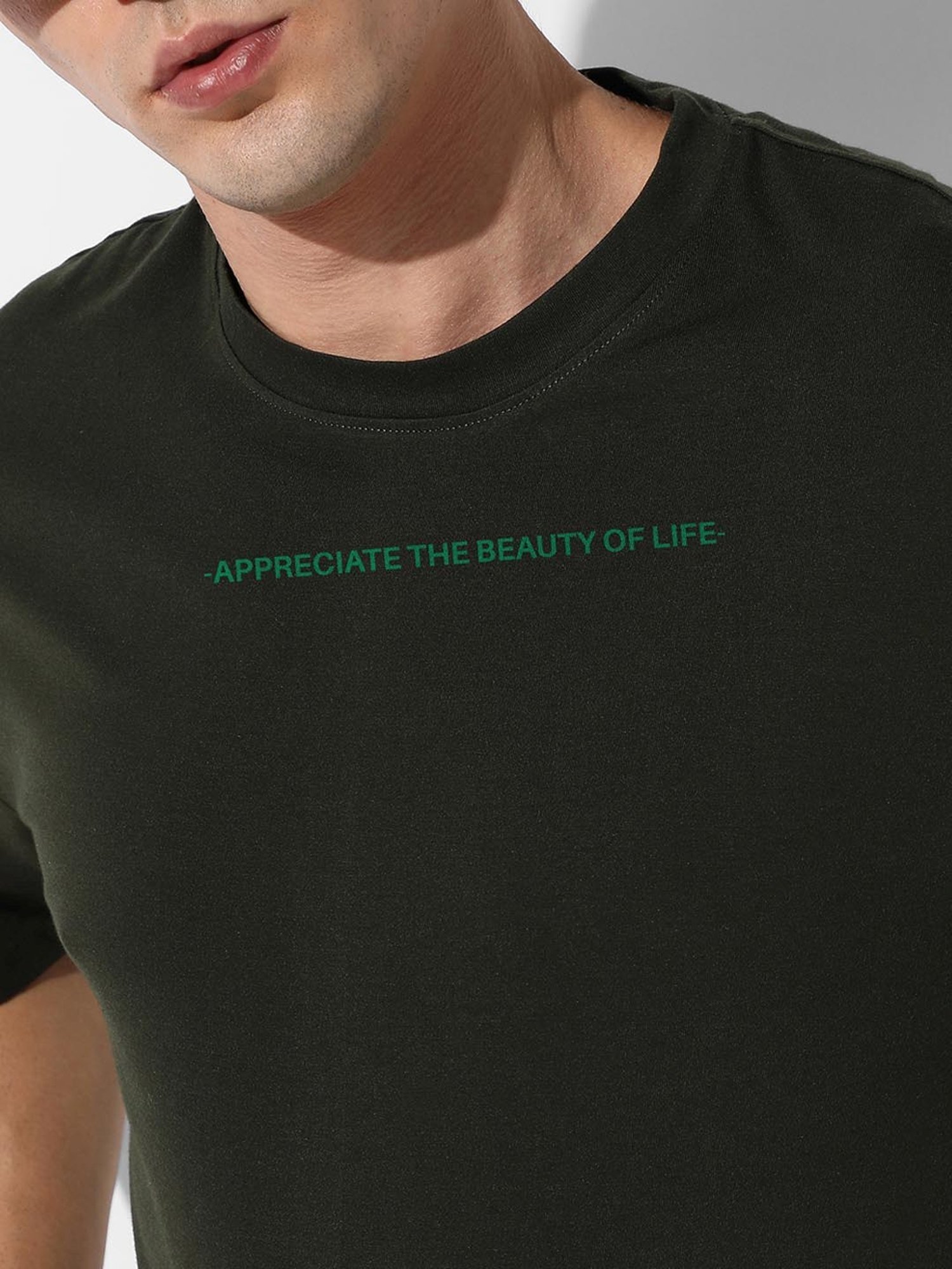 Campus Sutra Forest Green Regular Fit Oversized Smell The Flower Printed Co-Ord Set