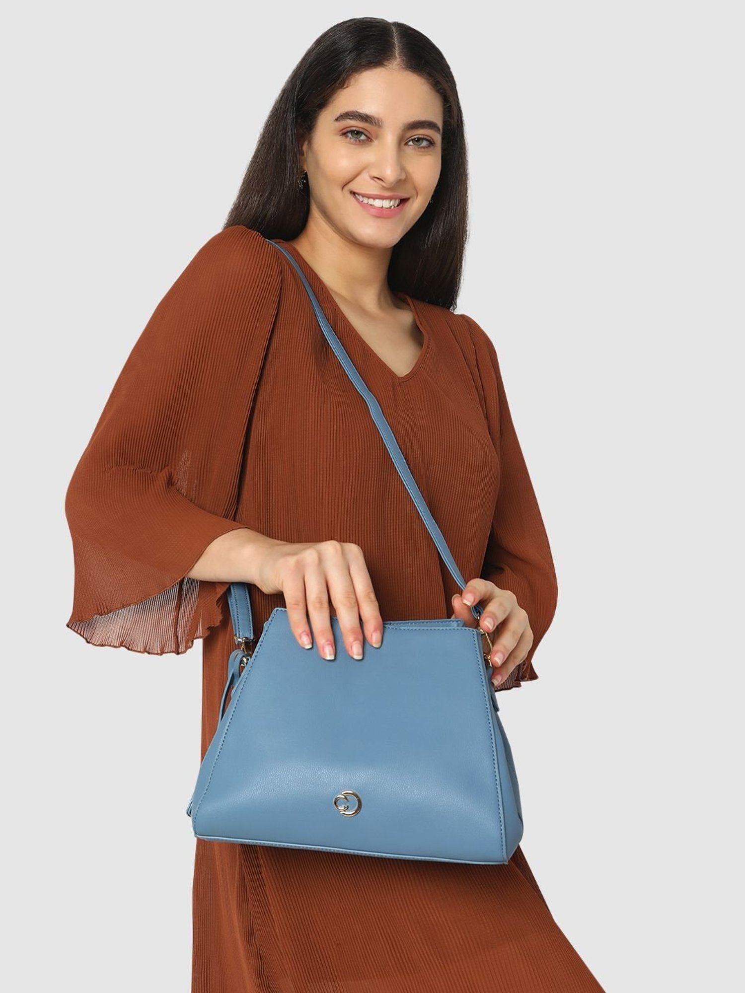 Caprese Milan Blue Faux Leather Solid Sling Handbag