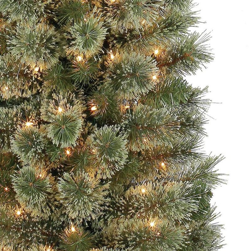 Home Heritage 7 Foot Pre-Lit Skinny Artificial Stanley Pencil Pine Christmas Tree with Clear White Lights, Foldable Stand and Easy Assembly