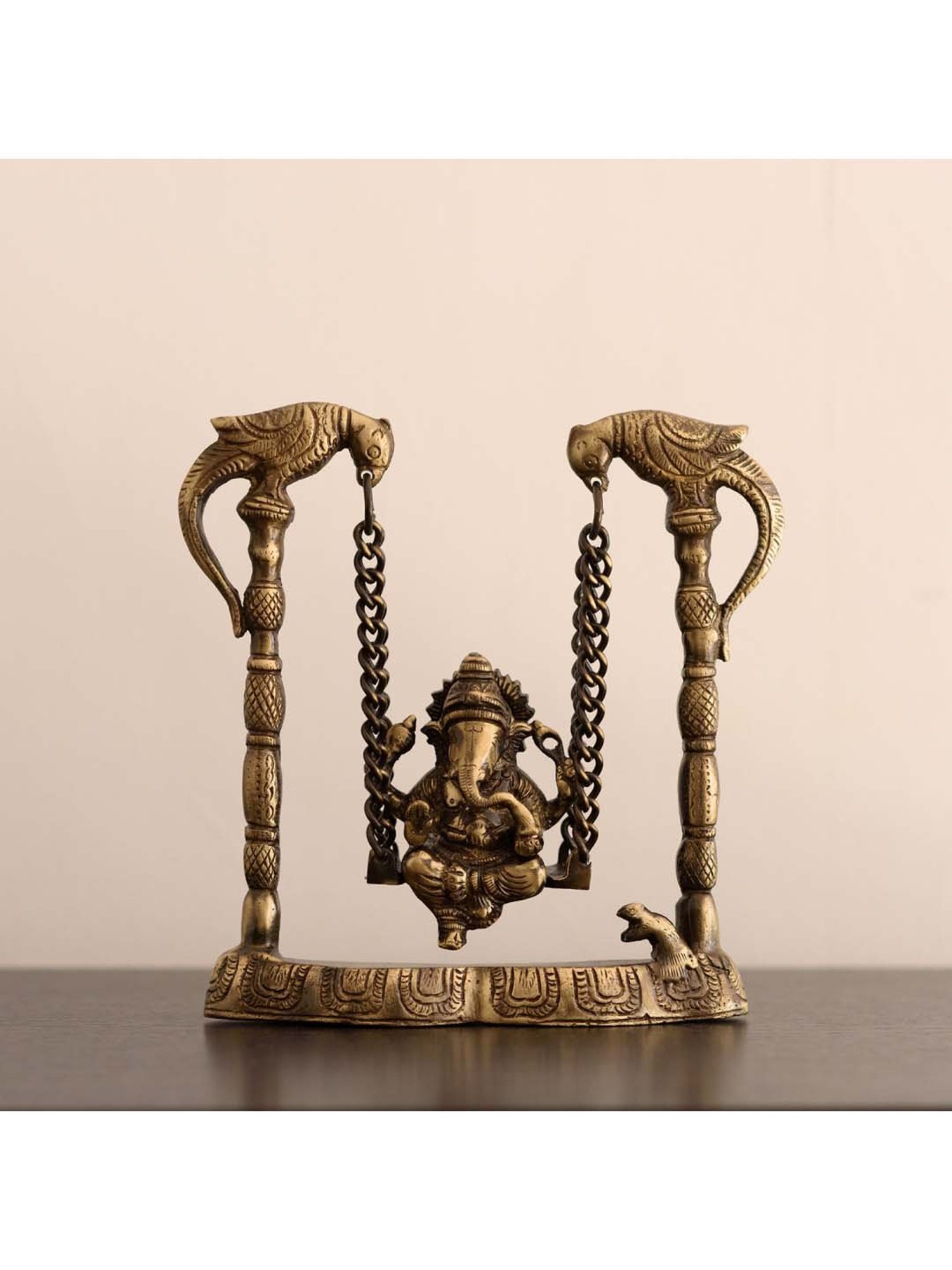 eCraftIndia Brass Lord Ganesha on Peacock Jhoola/Swing