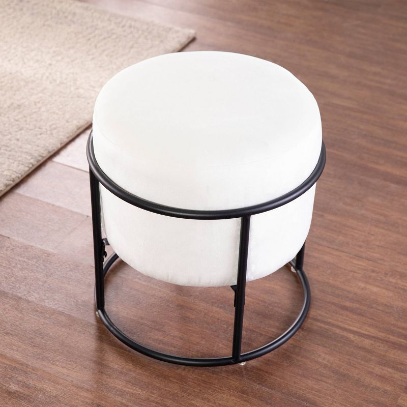 Uplynn Round Upholstered Ottoman Gray/Black - Holly & Martin