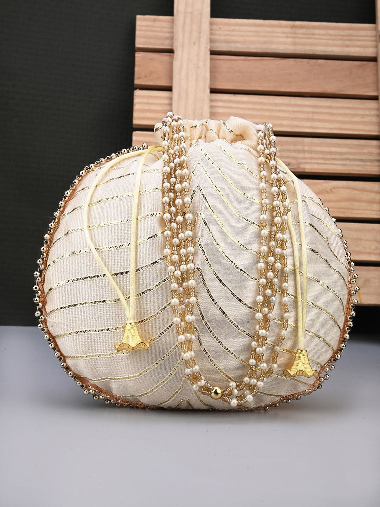 Gaurapakhi Off White Striped Small Potli