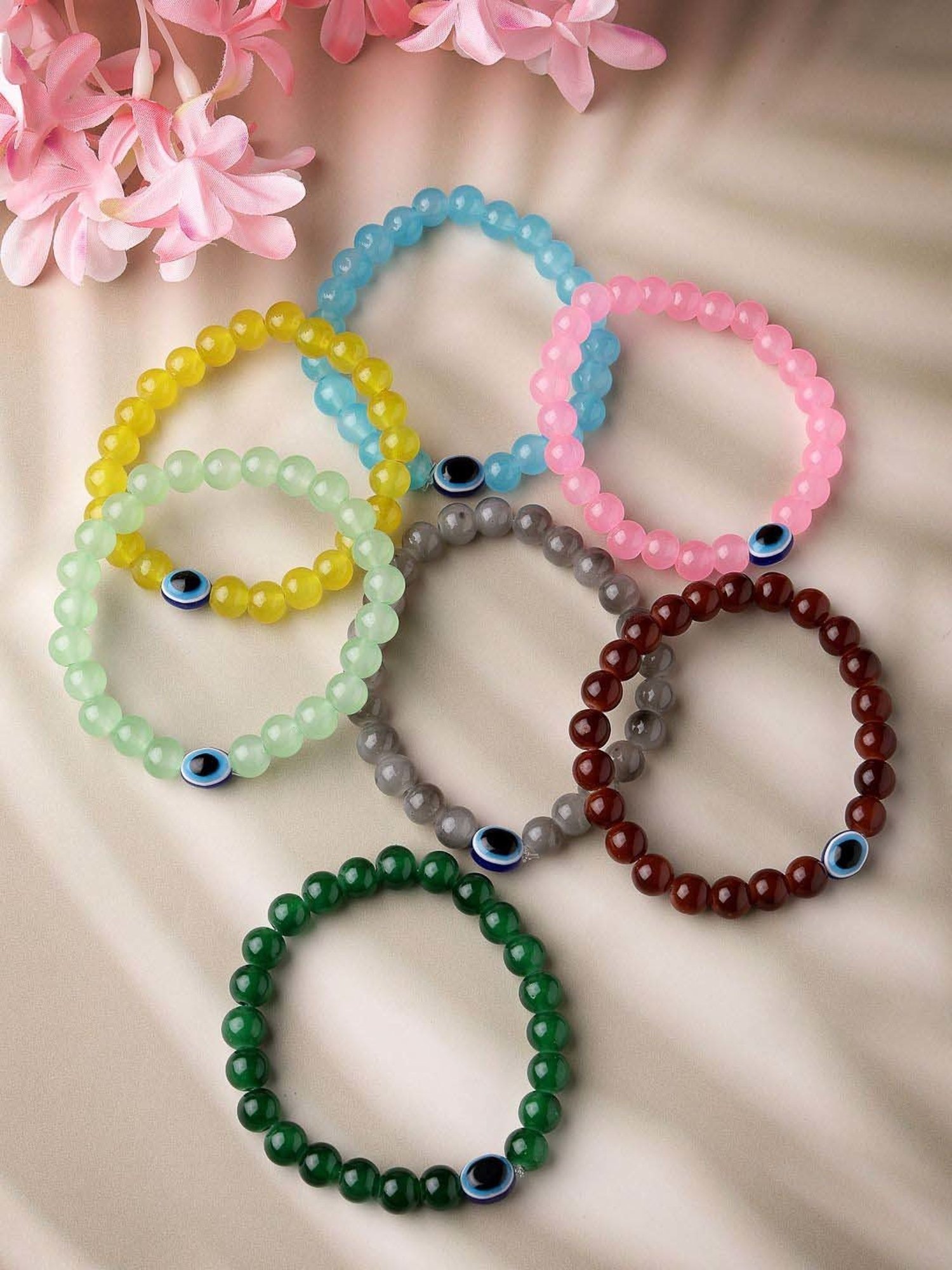 NVR Crystals Beaded Evil Eye Elasticated Bracelet for Unisex - Set Of 7