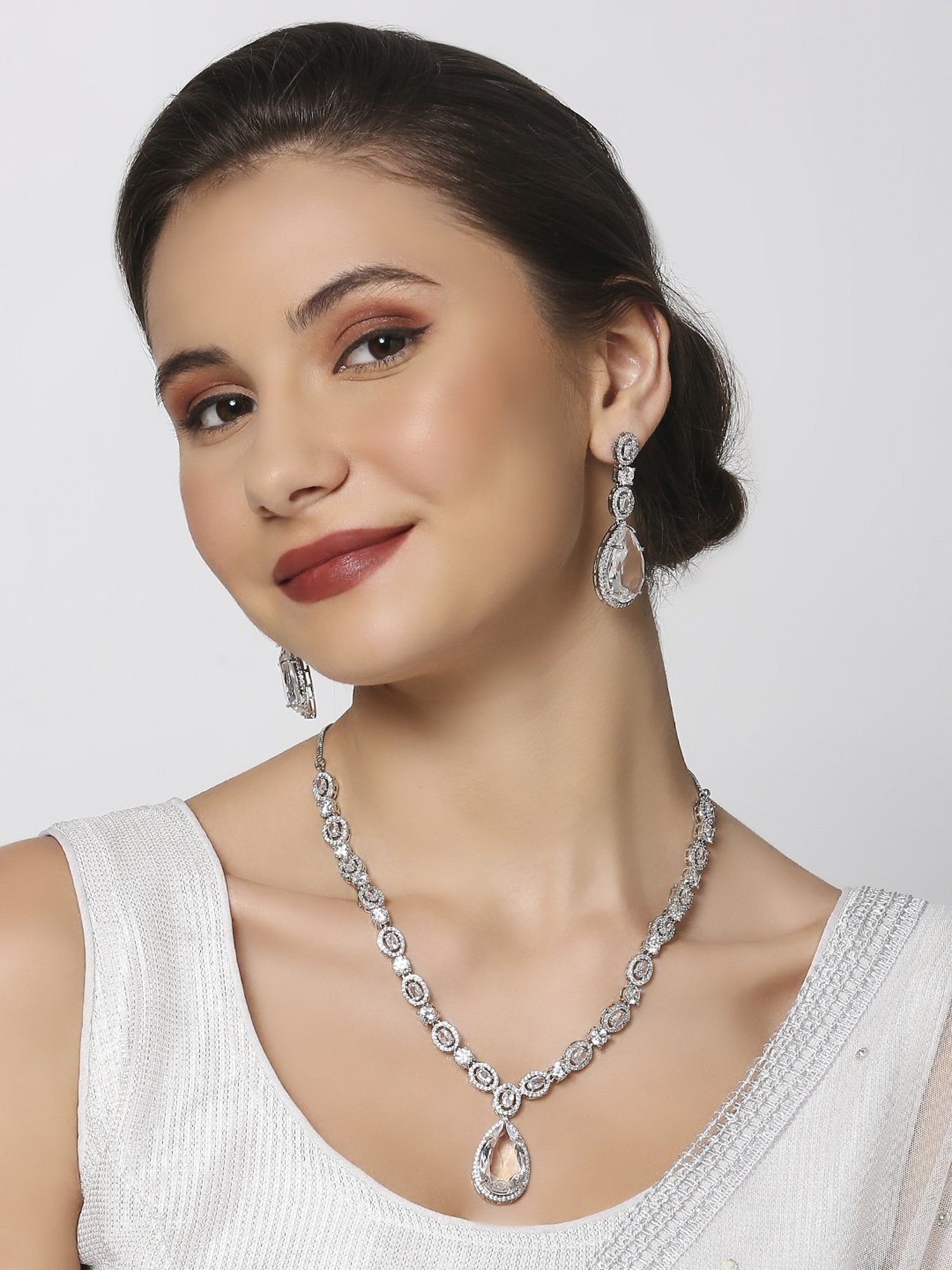 OOMPH Silver Tone American Diamond TearDrop Pendant Necklace Set with Earrings