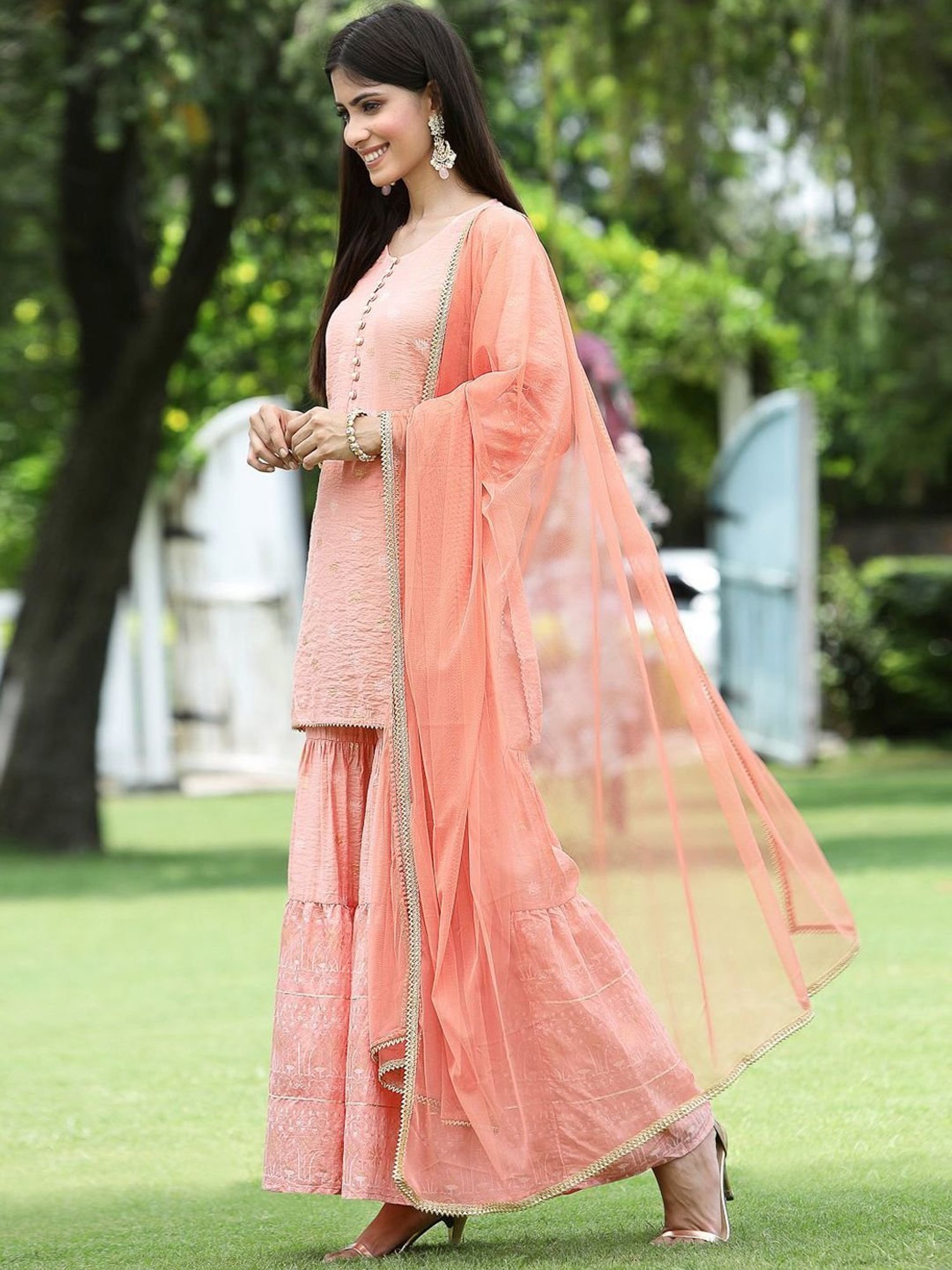 Juniper Peach Ethnic Motif Printed Viscose Muslin Kurta Sharara & Net Dupatta Set