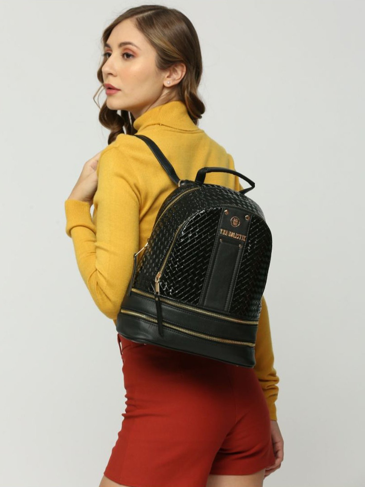 THE HOLISTIK Retro Wave Black Textured Medium Backpack