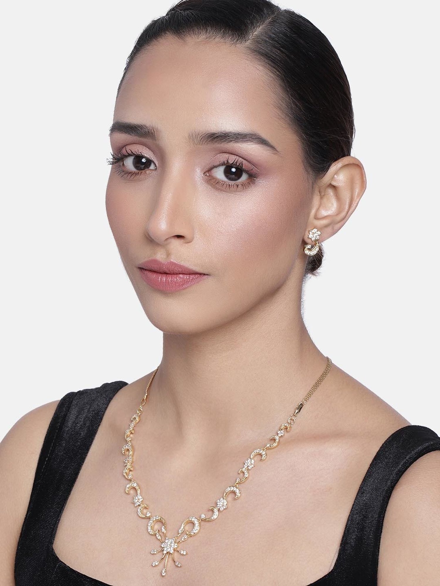 Estele Gold-Plated White CZ Nakshatra Swirl Necklace & Earring Set for Women