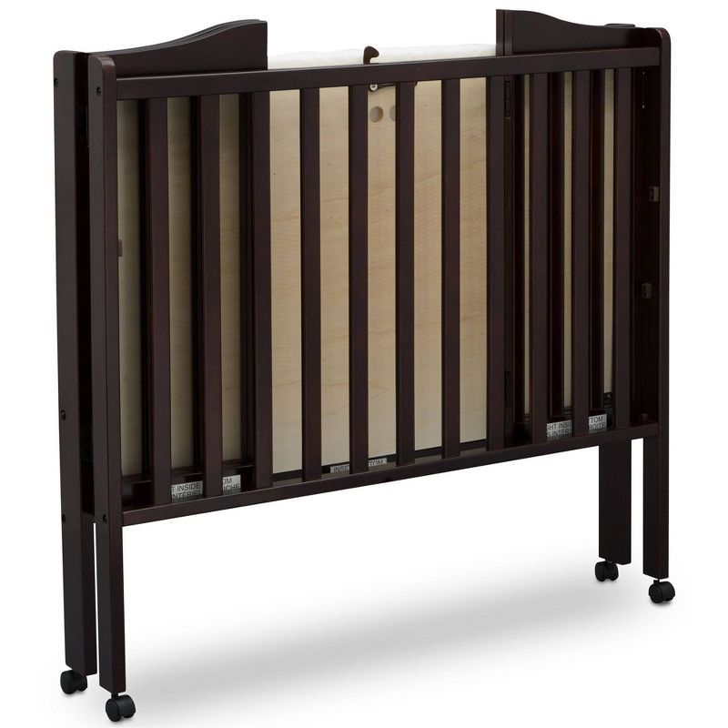 Delta Children Folding Portable Mini Baby Crib with 1.5'' Mattress, Greenguard Gold Certified - Dark Chocolate