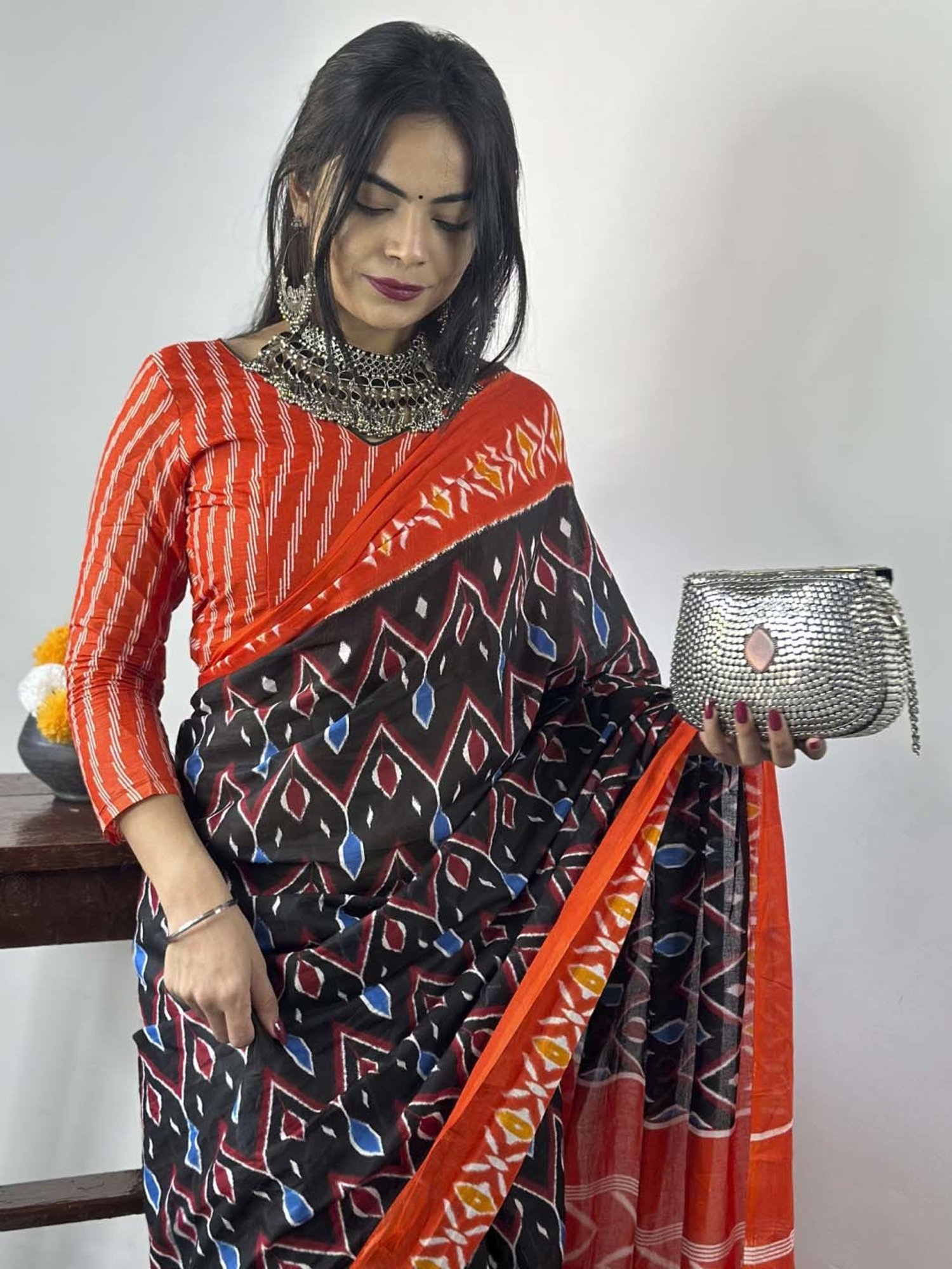 Saree Mall Black & Orange Cotton Printed Saree With Unstitched Blouse