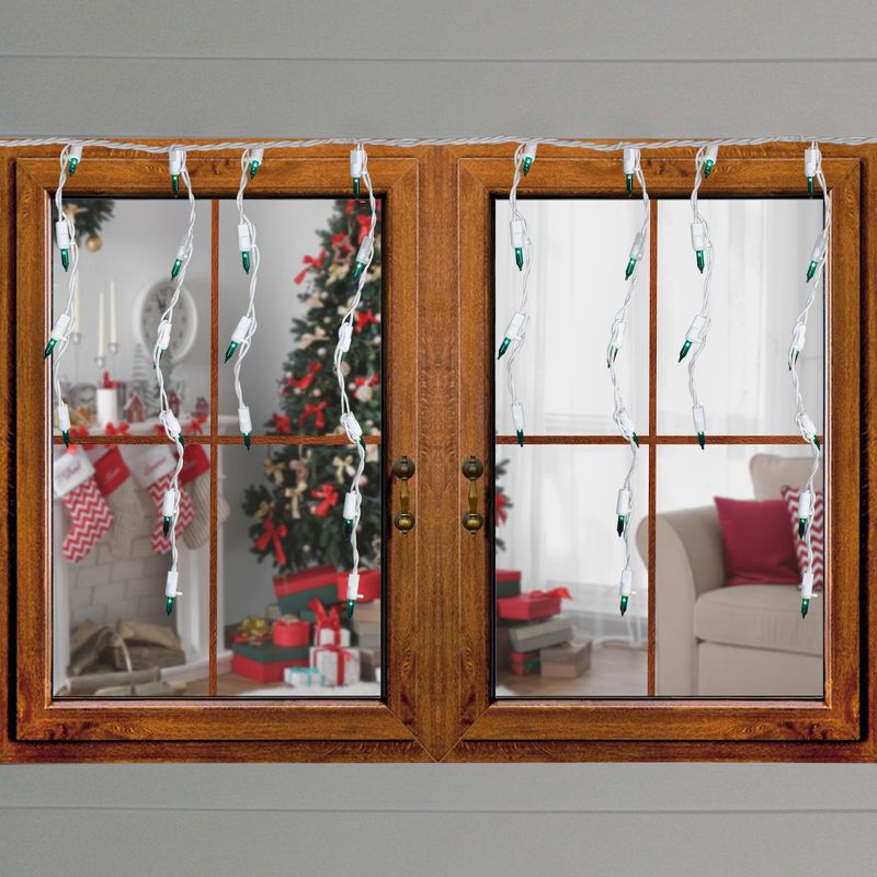 J. Hofert Co Set of 100 Green Everglow Icicle Christmas Lights, 6.6' White Wire