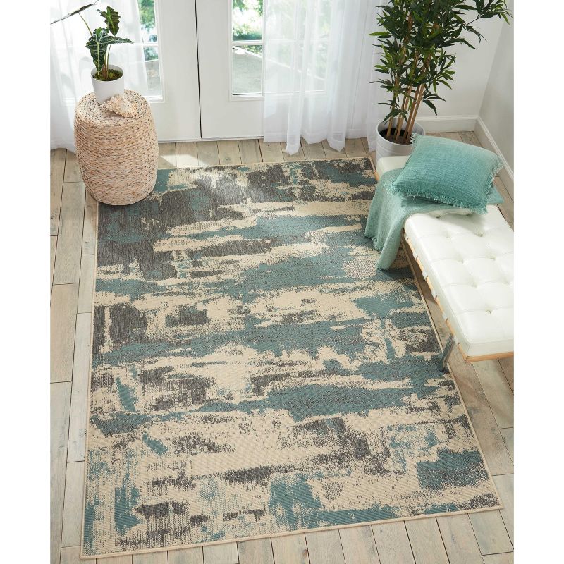 7'10"x10'6" Rectangle Indoor and Outdoor Woven Multi Burst Area Rug Blue - Barclay Butera