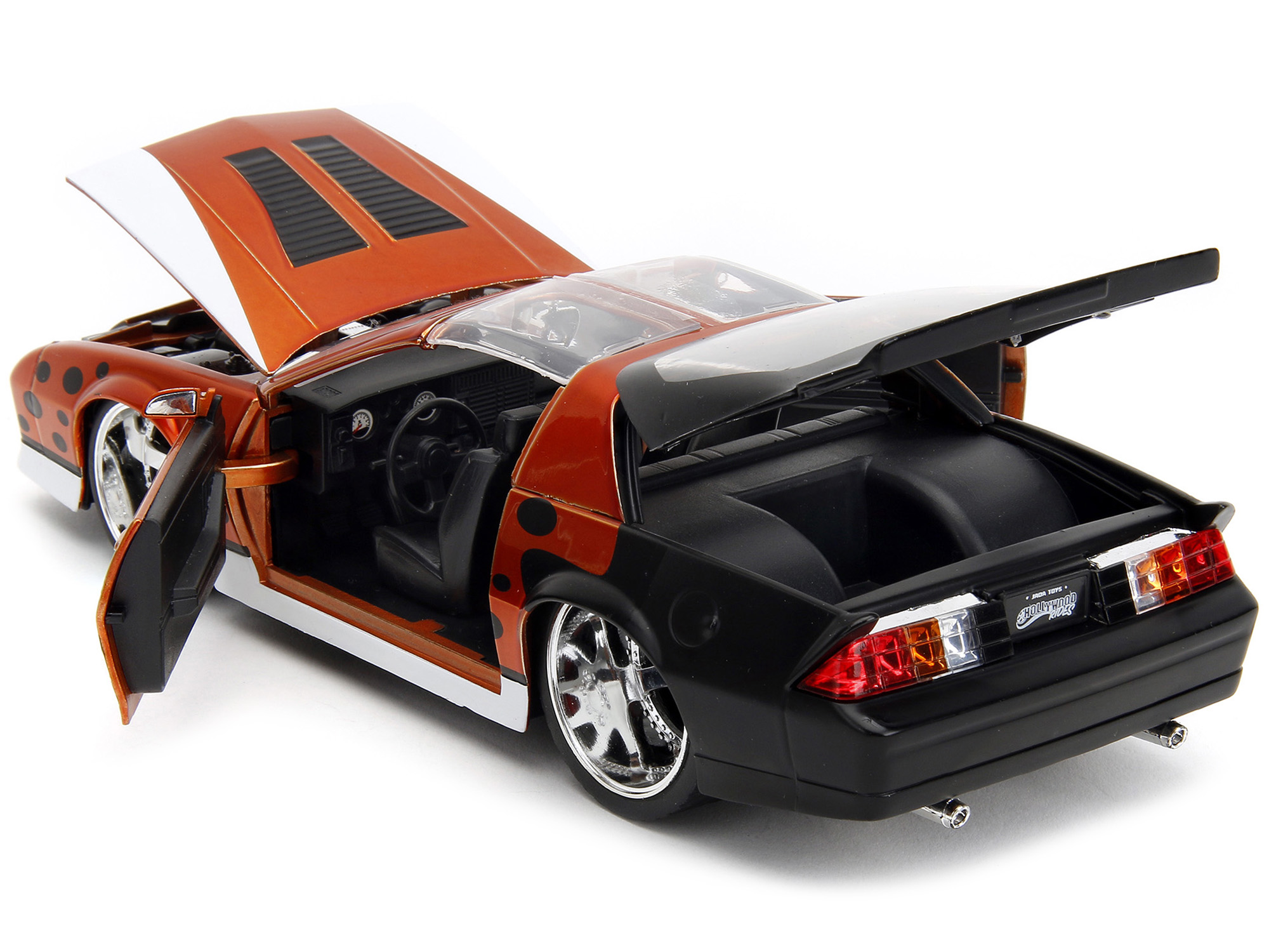 1985 Chevrolet Camaro Z/28 Orange Metallic with Graphics and Chester Cheetah Diecast Figure "Cheetos" "Hollywood Rides" Series 1/24 Diecast Model Car by Jada