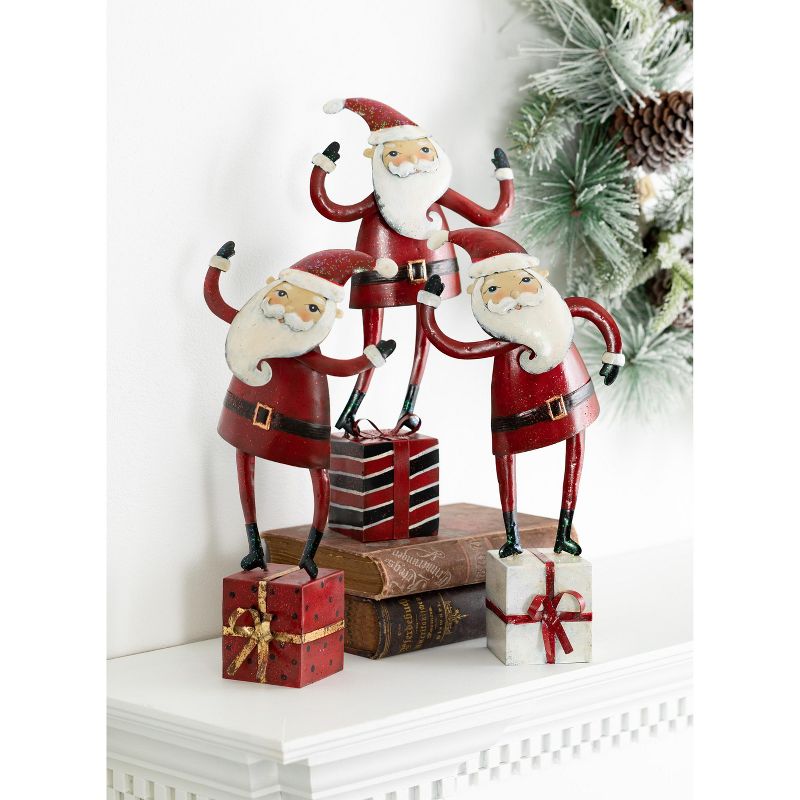 Sullivans Santa with Gift Iron Novelty Set of 3, 13.5"H, 13.5"H & 13"H Multicolored