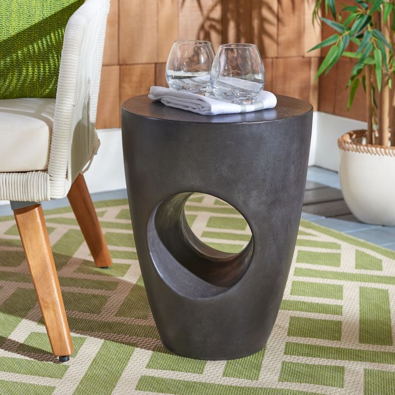 Aishi Indoor/Outdoor Modern Concrete Round Accent Table - Black - Safavieh