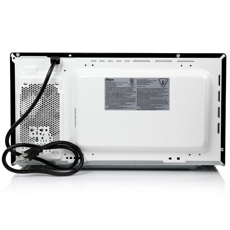 Oster 1.1 CuFt Digital Microwave Oven in Black and Silver