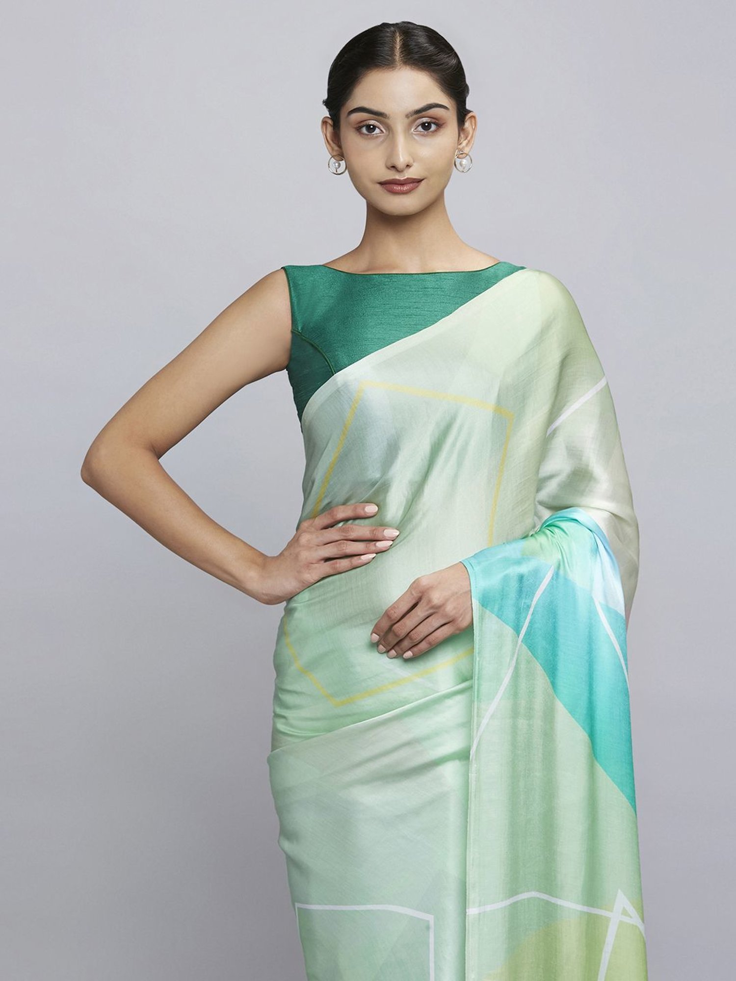 Navyasa Sea Green Liva Satin Geometric Printed Saree With Coordinated Unstitched Blouse Piece