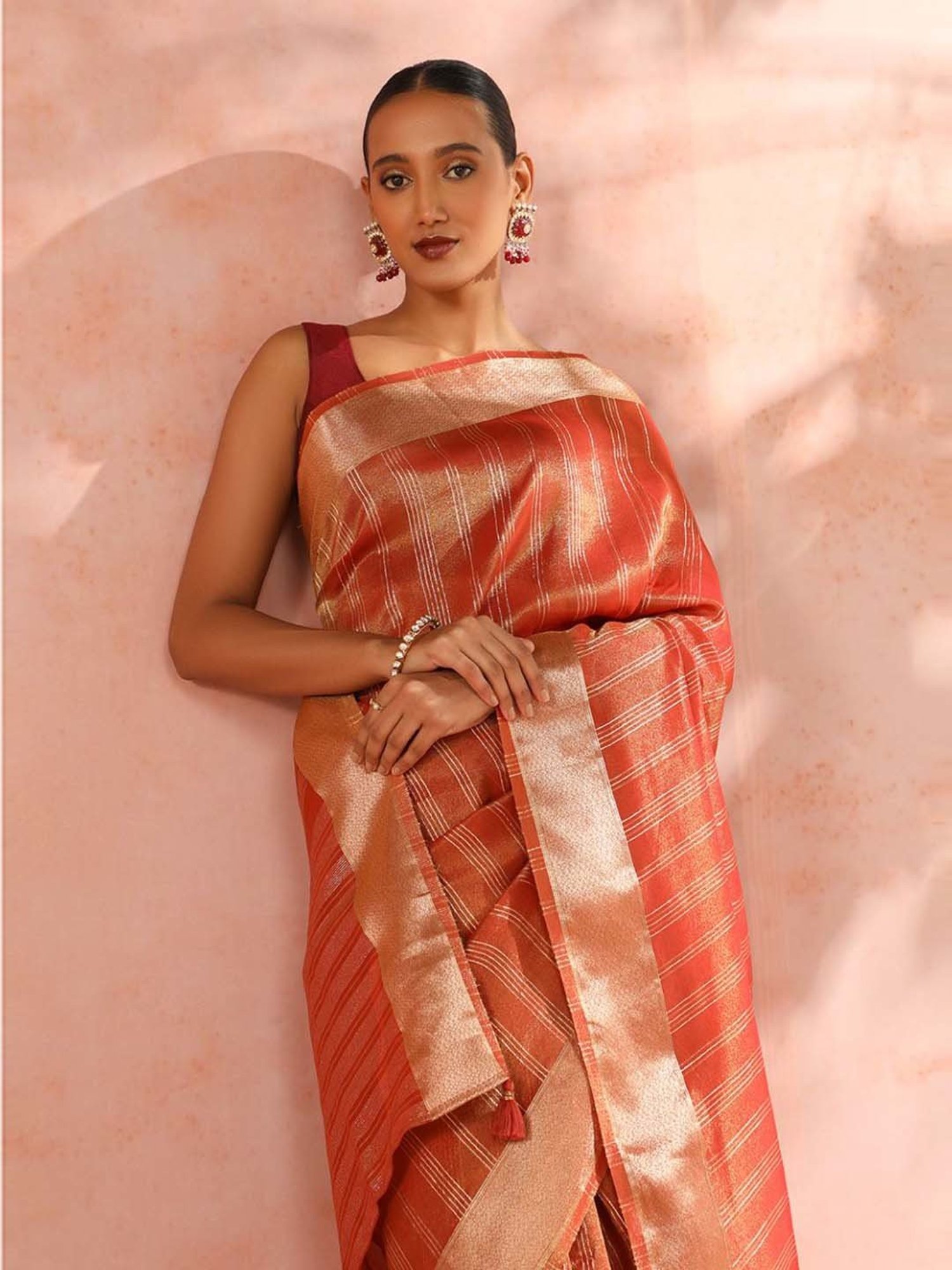 Taneira Orange Woven Saree With Unstitched Blouse