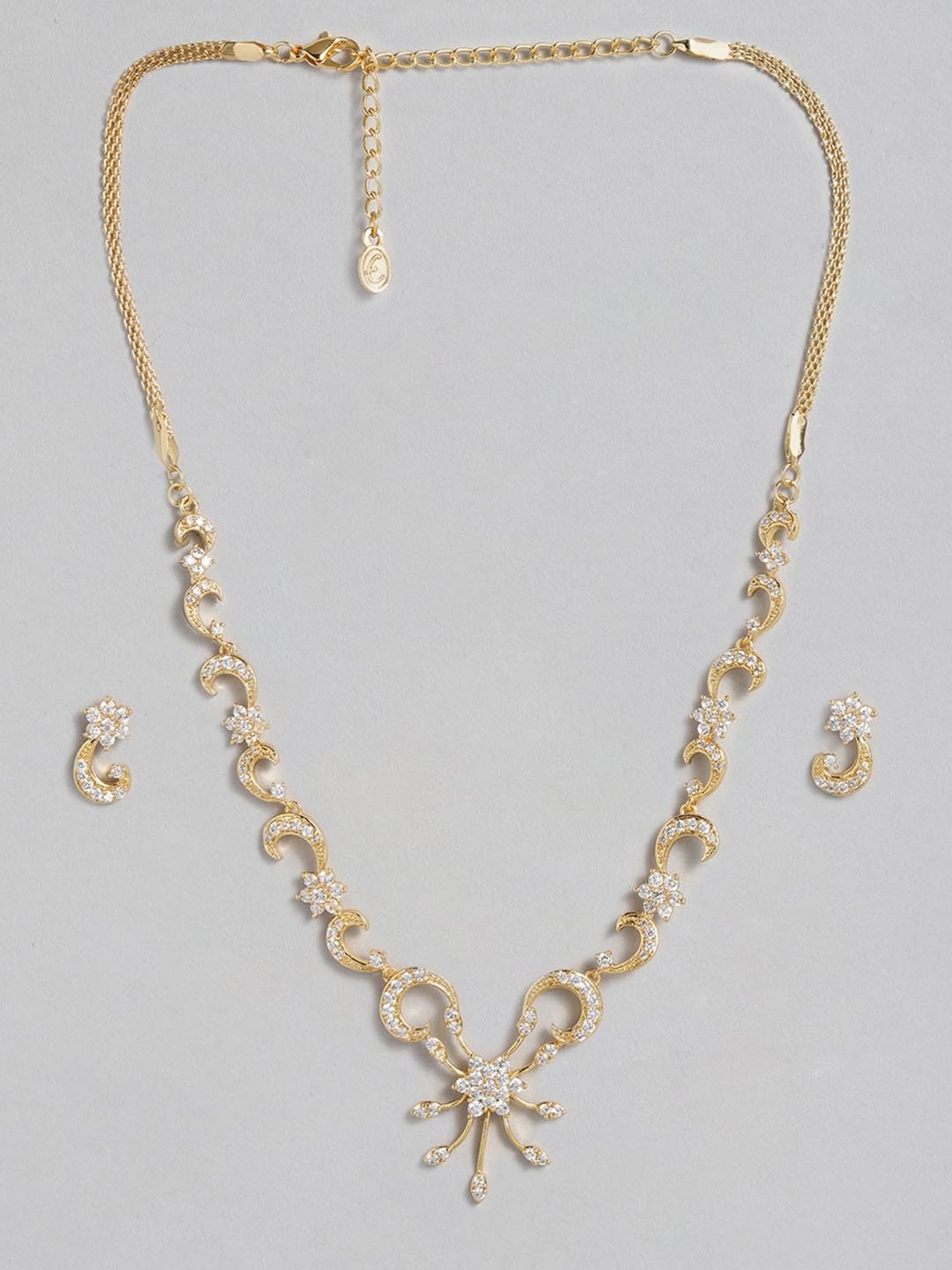 Estele Gold-Plated White CZ Nakshatra Swirl Necklace & Earring Set for Women