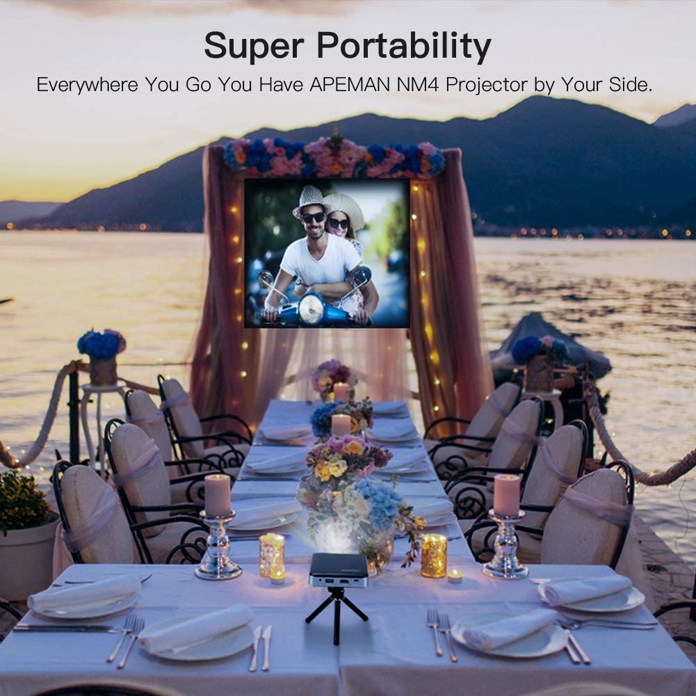 APEMAN NM4 Mini Portable Projector, Video DLP Pocket Projector for Home and Outdoor Entertainment, Support 1080P HDMI Input Built-in Rechargeable Battery Stereo Speakers with Upgraded 360&deg; Tripod