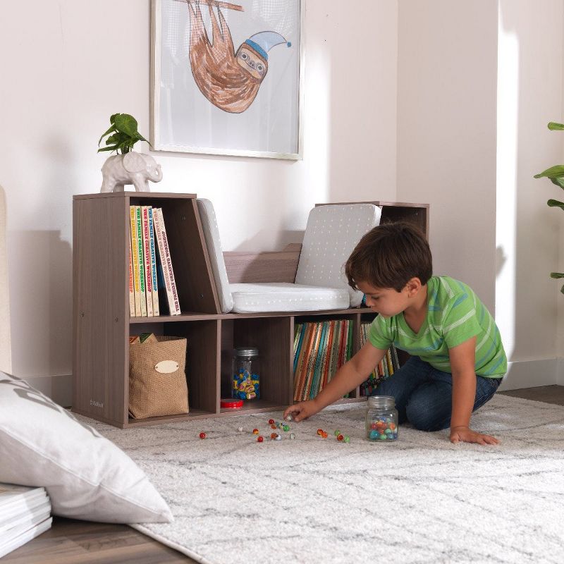 KidKraft Wooden Bookcase Storage Shelving Unit with Comfortable Cushioned Children's Reading Nook and 6 Storage Organizer Cubbies, Gray