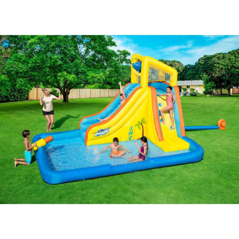 H2OGO! Beachfront Bonanza Kids Inflatable Outdoor Backyard Mega Water Slide Splash Park Toy with Slide, Climbing Wall, Sprayer, and Kiddie Pool