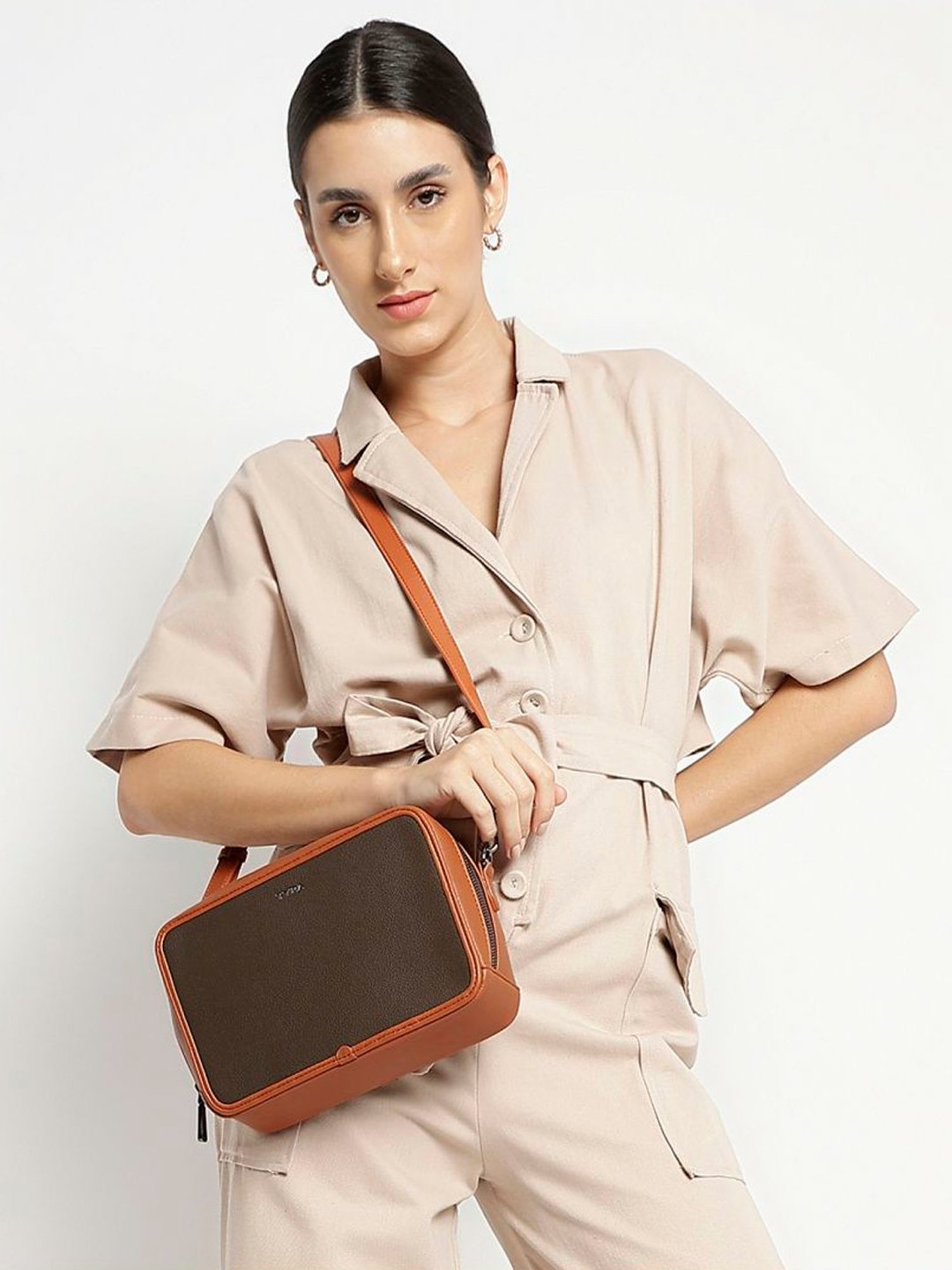 Tyra Sladison Brown Solid Faux Leather Sling Handbag