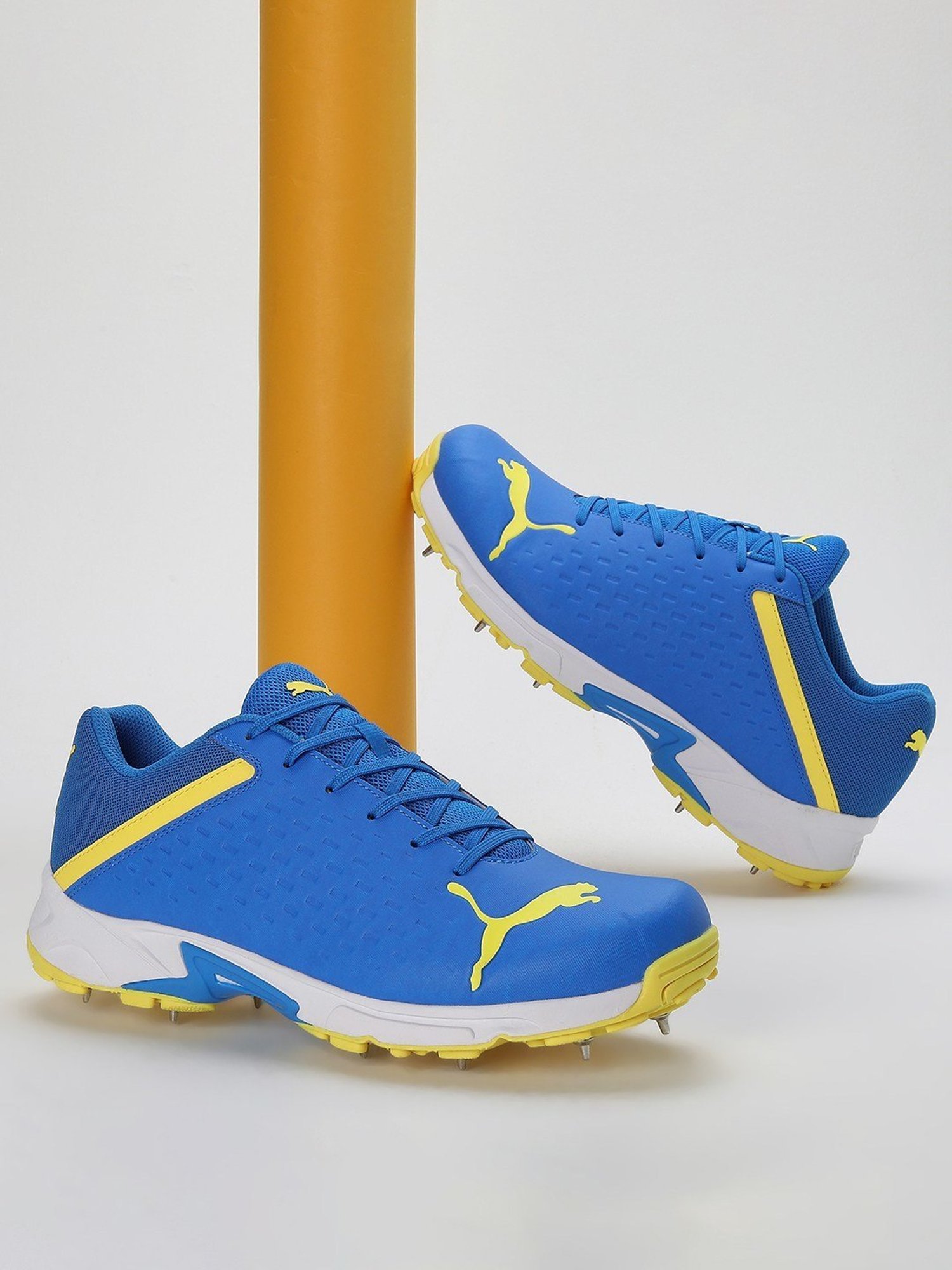 Nivia Men's Track and field-100 Orange Cricket Shoes