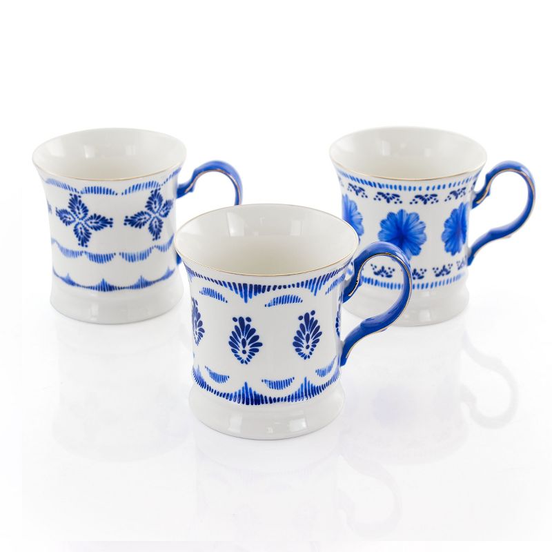 Meritage Navy 12 Piece 13.2 Ounce Fine Ceramic Cup Set in White with 4 Assorted Designs