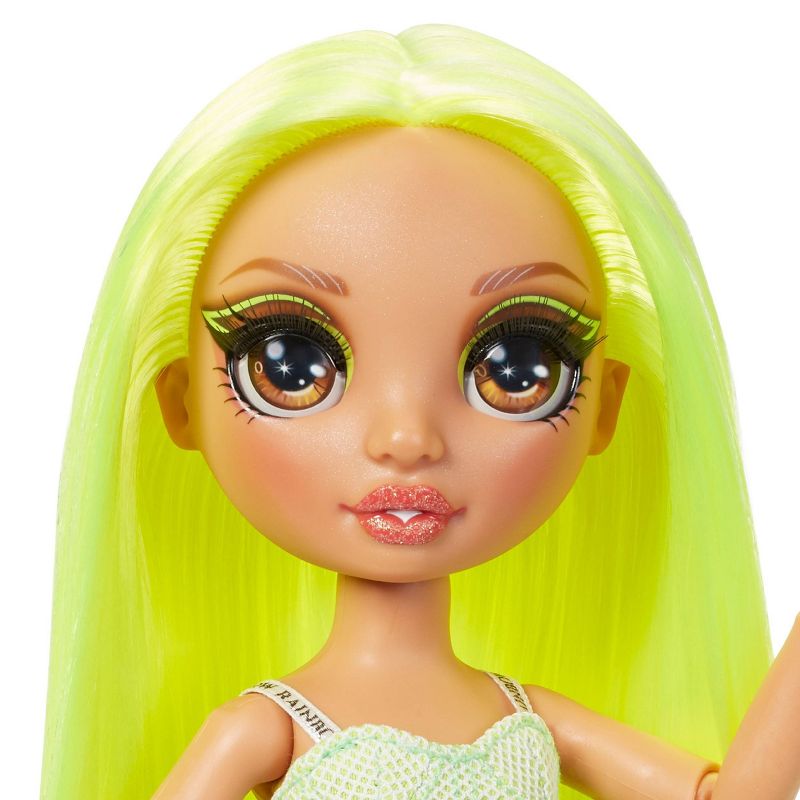 Rainbow High Karma Nichols – Fashion Doll with 2 Complete Mix & Match Outfits and Doll Accessories