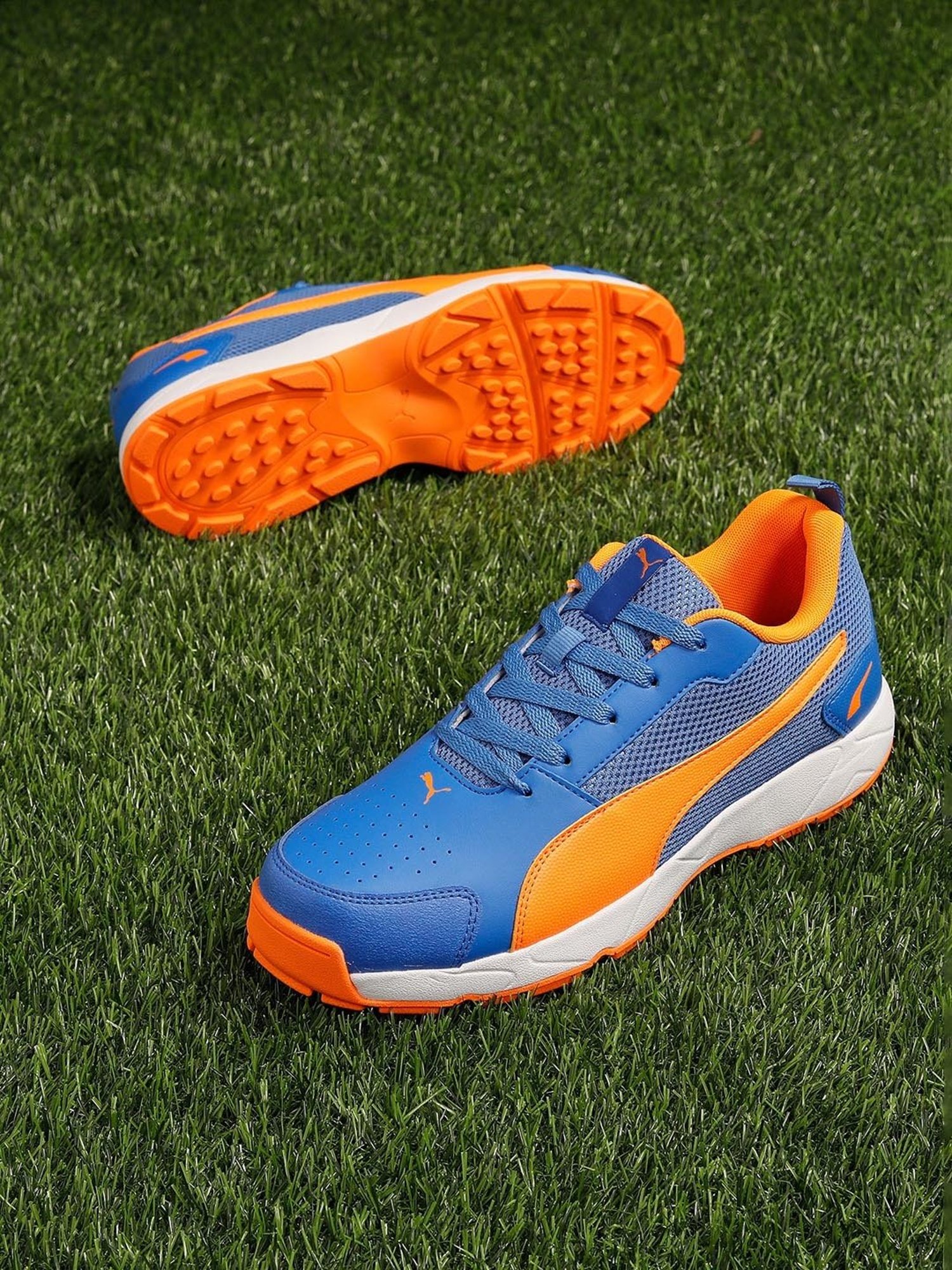 Nivia Men's Track and field-100 Orange Cricket Shoes