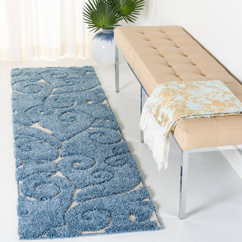 2'3"x9' Runner Swirl Loomed Rug Light Blue/Cream - Safavieh