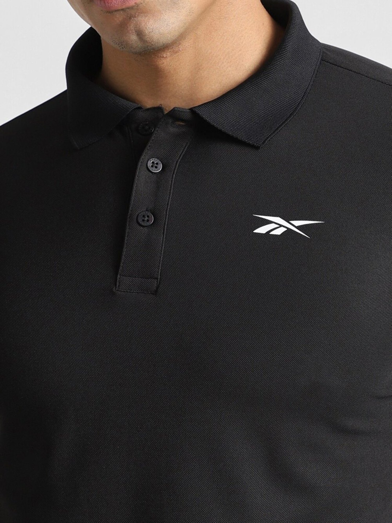 Reebok Black Polyester Slim Fit Solid Polo T-Shirt