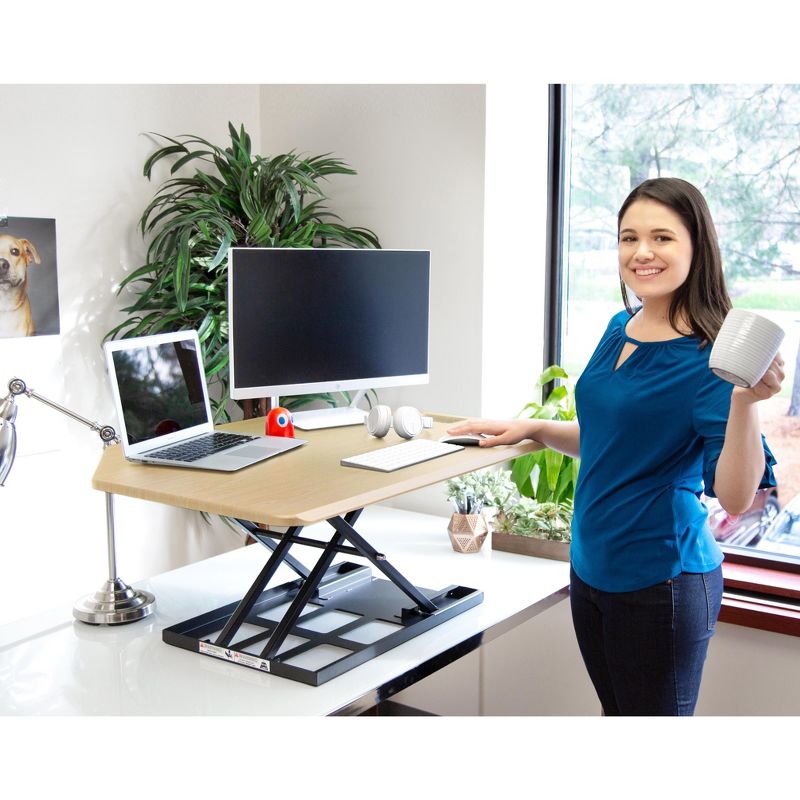 X-Elite Premier Corner Standing Desk Converter with Pneumatic Height Adjustment - Maple - Stand Steady