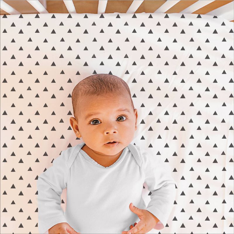 The Peanutshell Triangle Print Cotton Fitted Crib Sheet in Black/White