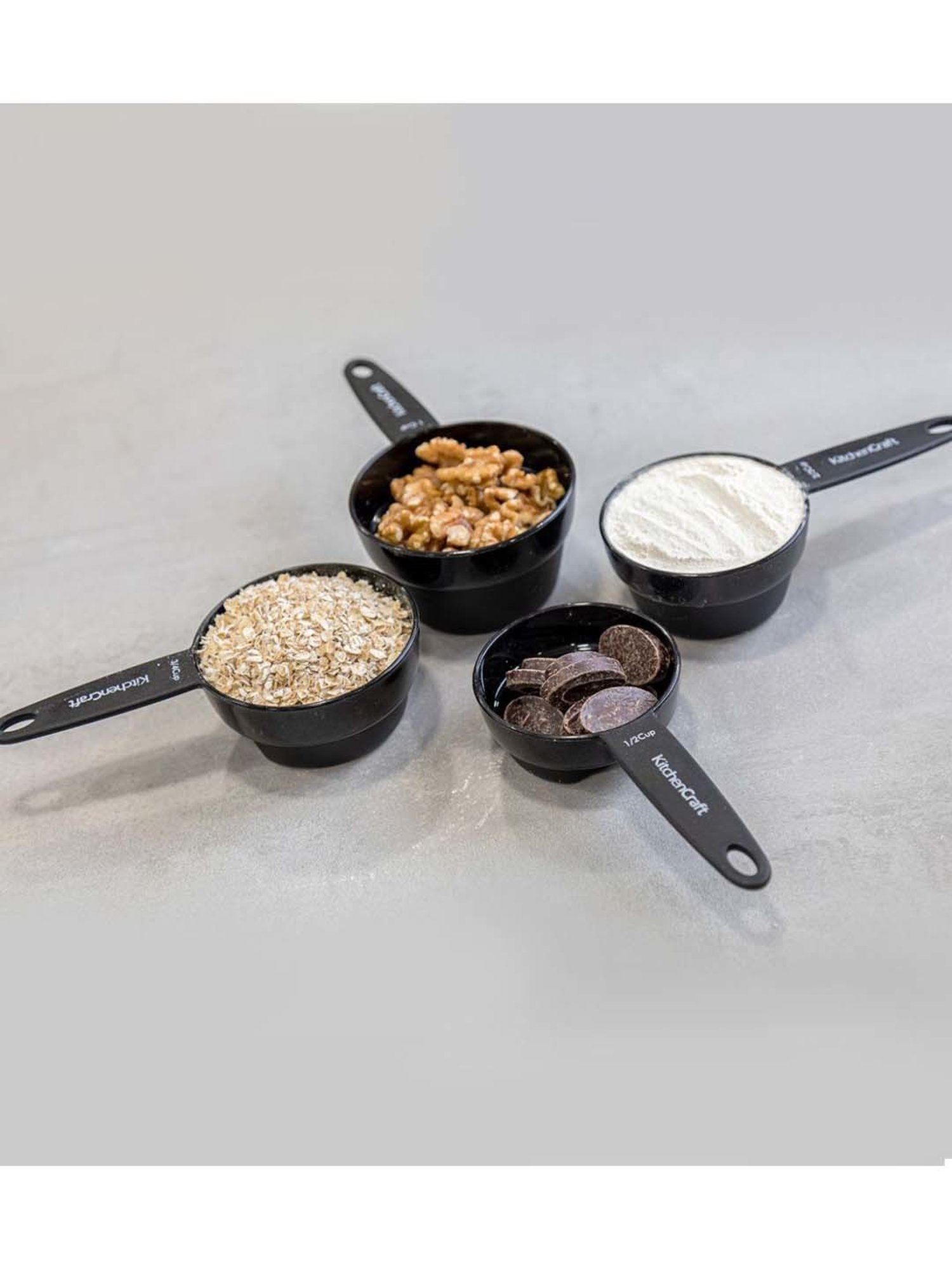 KitchenCraft Black Plastic Magnetic Measuring Cup - Set of 4