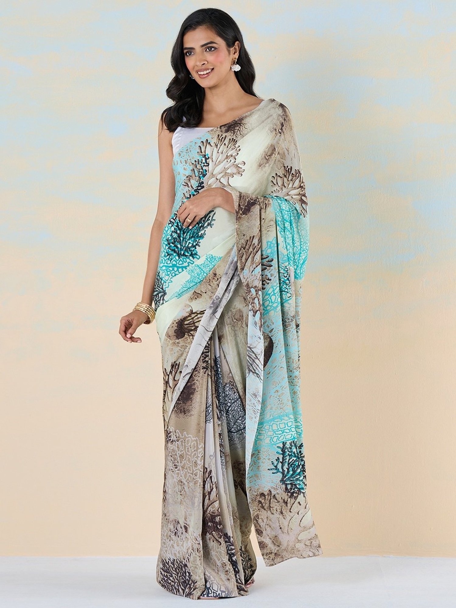 navyasa by liva Blue & Brown Printed Saree With Unstitched Blouse