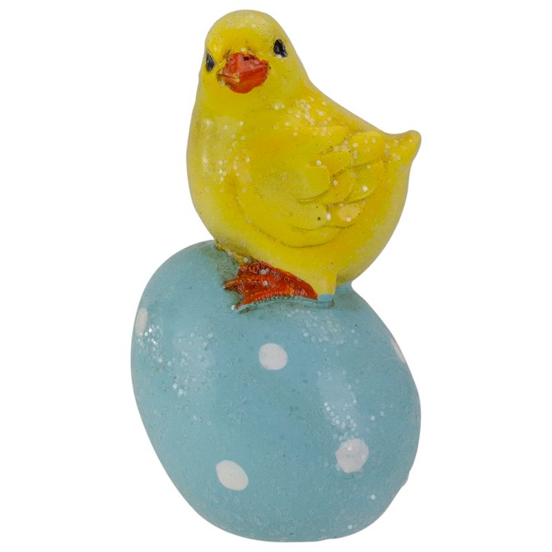 Darice 4" Yellow Chick Perched on a Blue Easter Egg Tabletop Decor