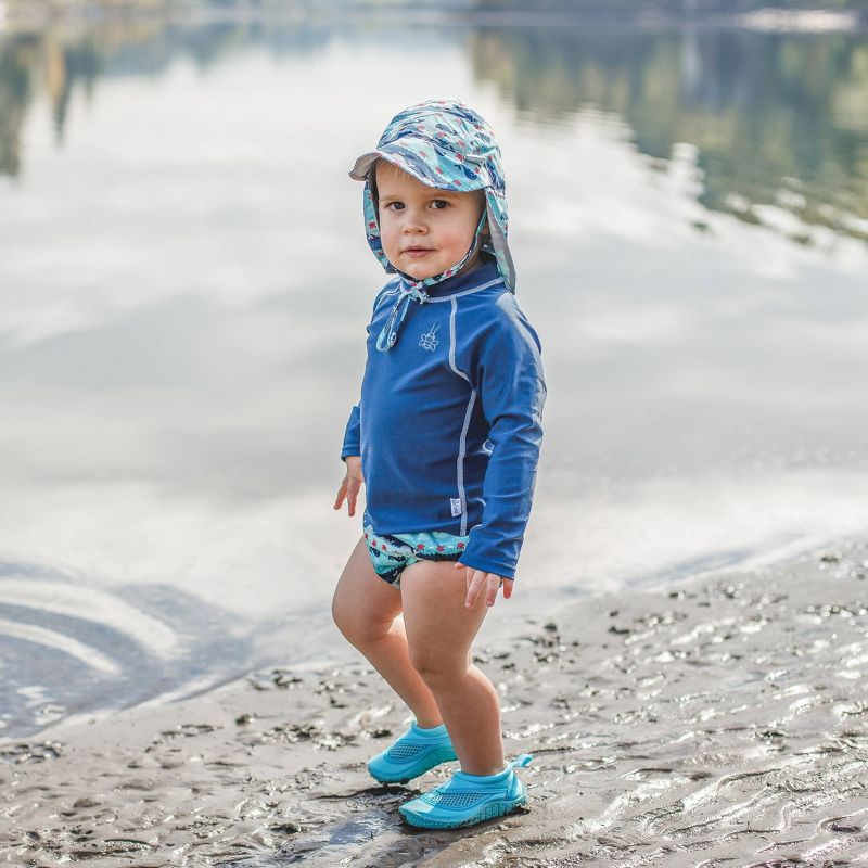 i play by green sprouts Baby Boys' Whale Stripe Reversible Flap Swim Hat - Navy/Aqua/Gray 0-6M