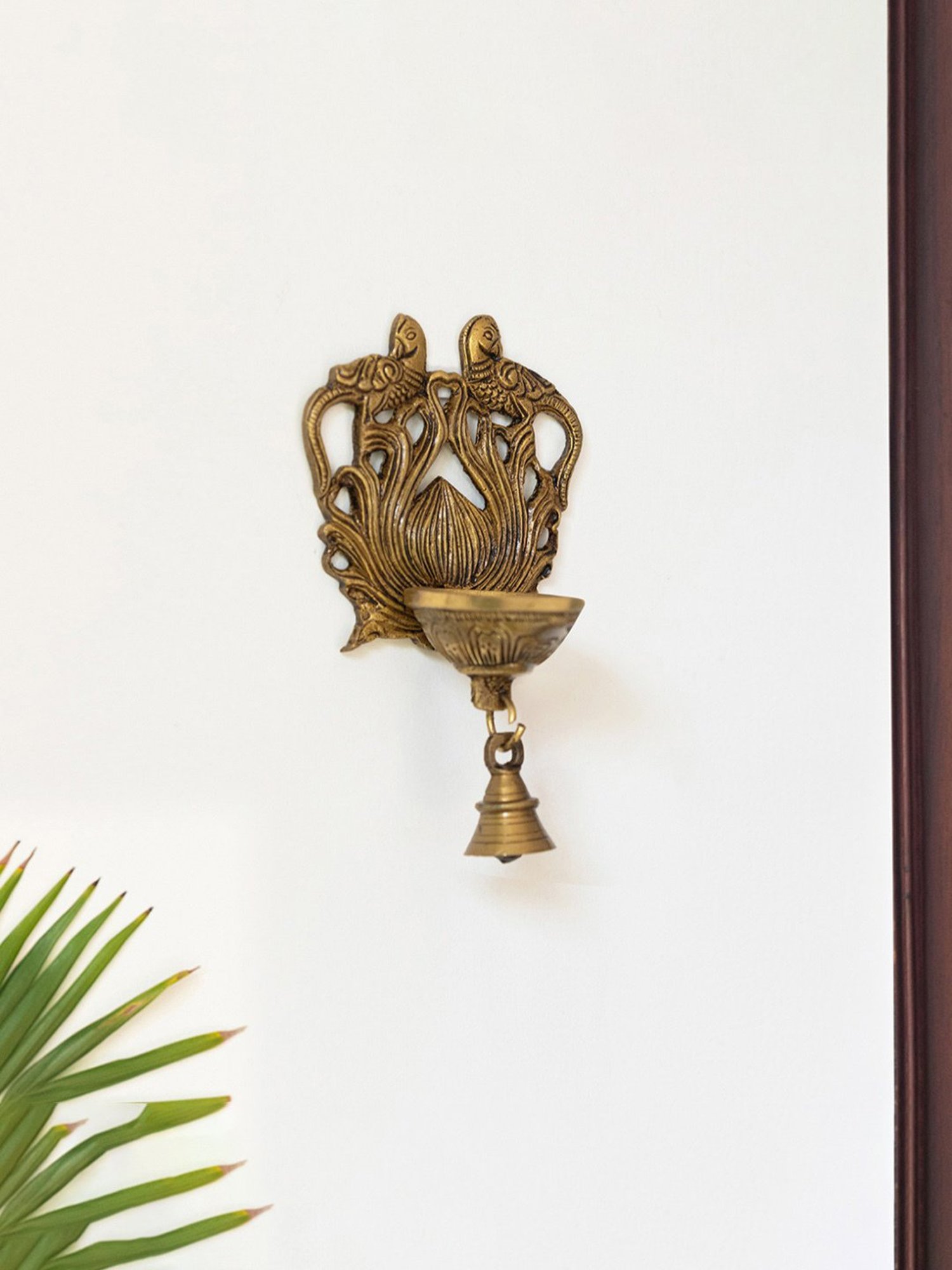 ExclusiveLane Gold Brass Carved Peacock Hand-Etched Decorative Wall Hanging Diya With Bells