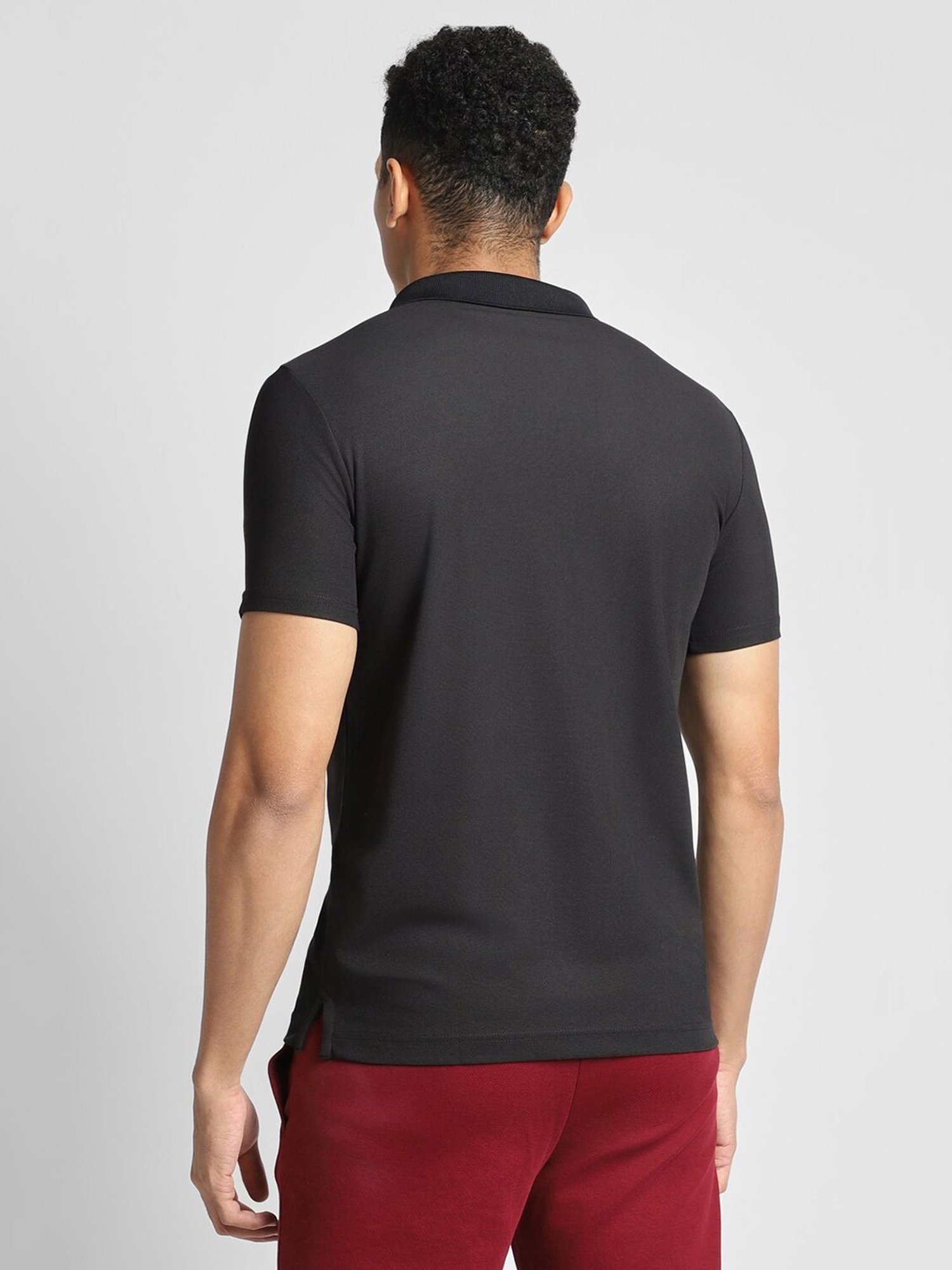 Reebok Black Polyester Slim Fit Solid Polo T-Shirt
