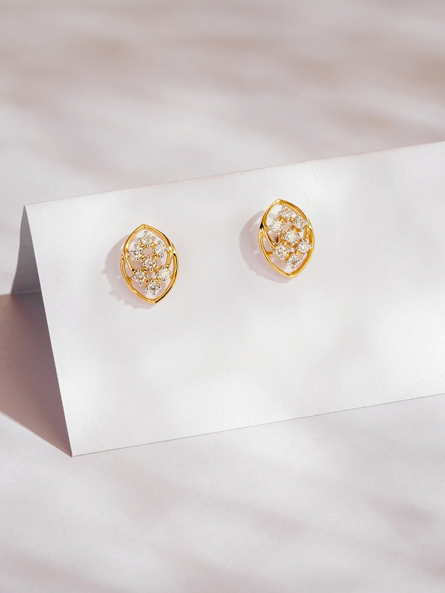 P.N.Gadgil Jewellers 14k Gold Twinkling Twist Stud Diamond Earrings For Women