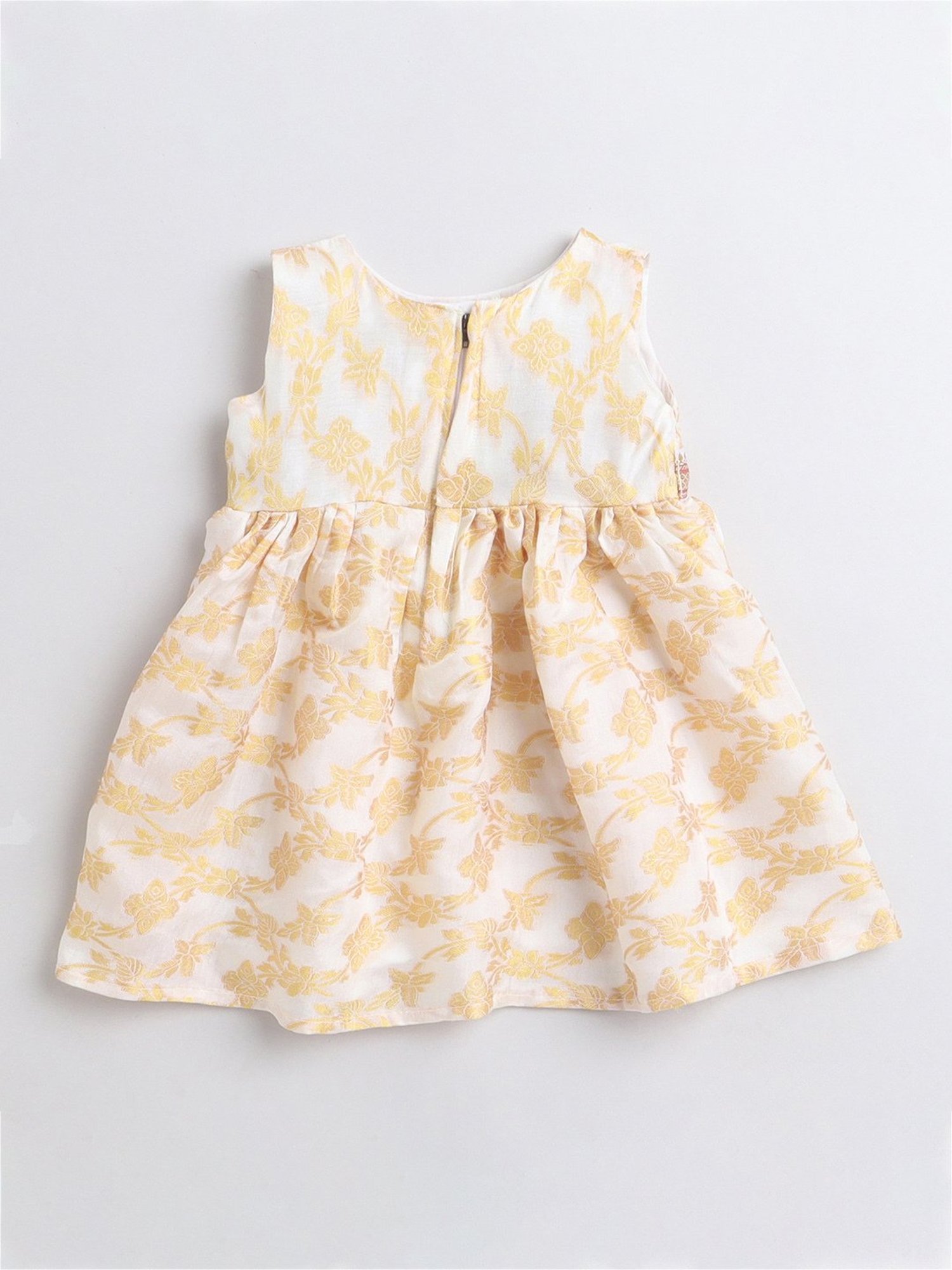 Many Frocks Kids Cream Self Design Dress