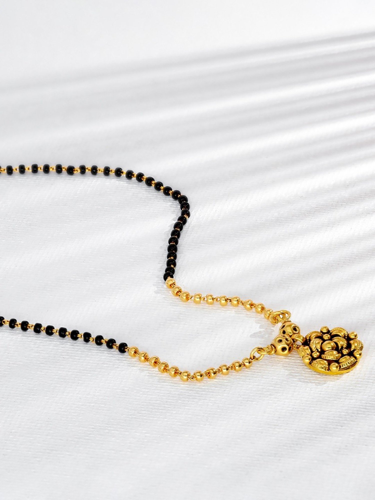 P.N.Gadgil Jewellers 22k Engraved Floweret Gold Mangalsutra