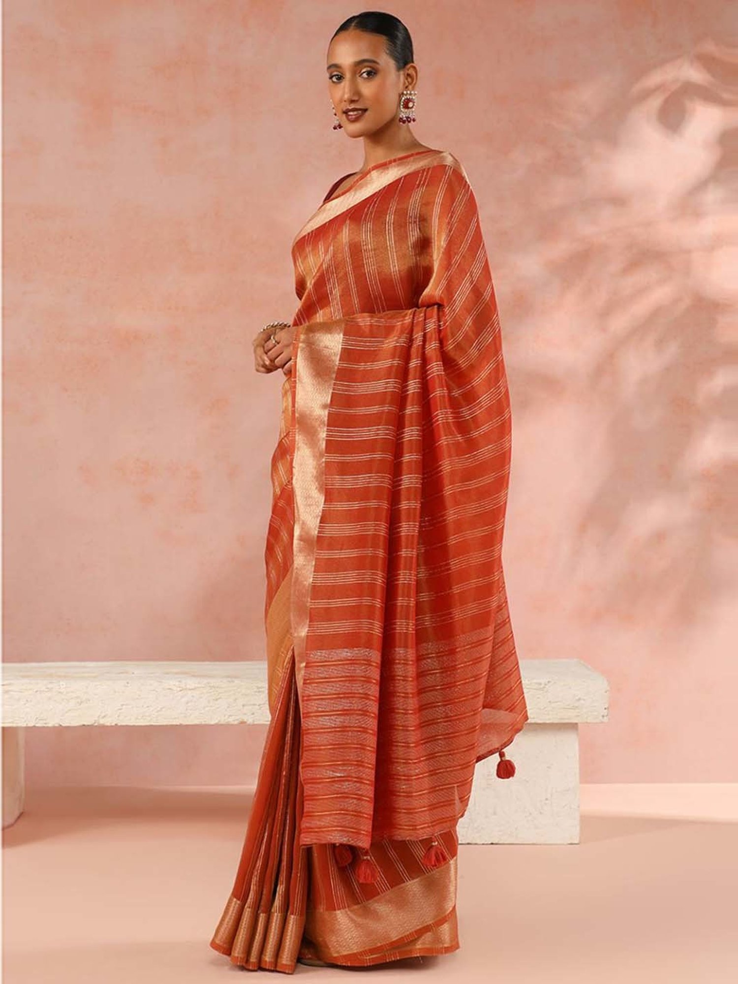Taneira Orange Woven Saree With Unstitched Blouse
