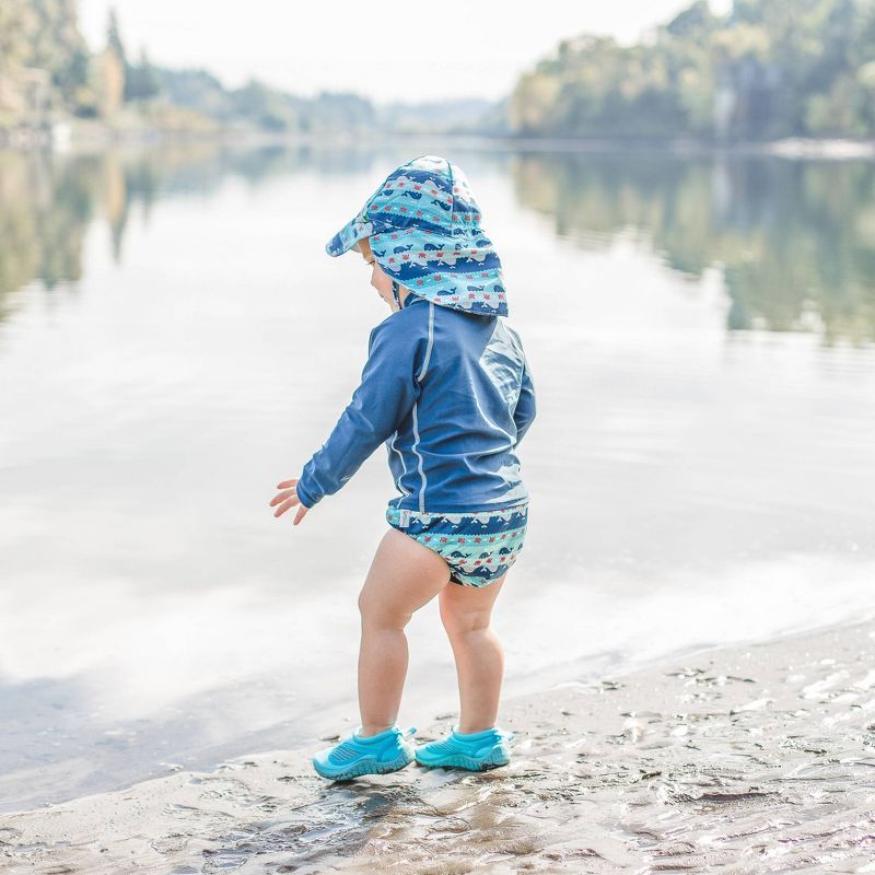 i play by green sprouts Baby Boys' Whale Stripe Reversible Flap Swim Hat - Navy/Aqua/Gray 0-6M