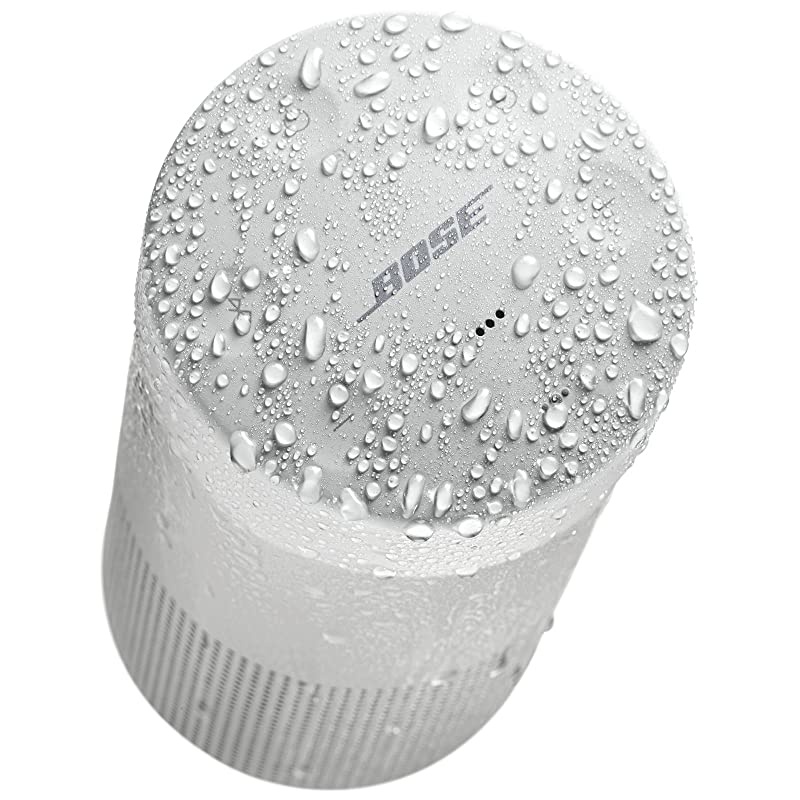 The  SoundLink Revolve, the Portable Bluetooth Speaker with 360 Wireless Surround Sound, Lux Gray &  SoundLink Revolve Charging Cradle Black