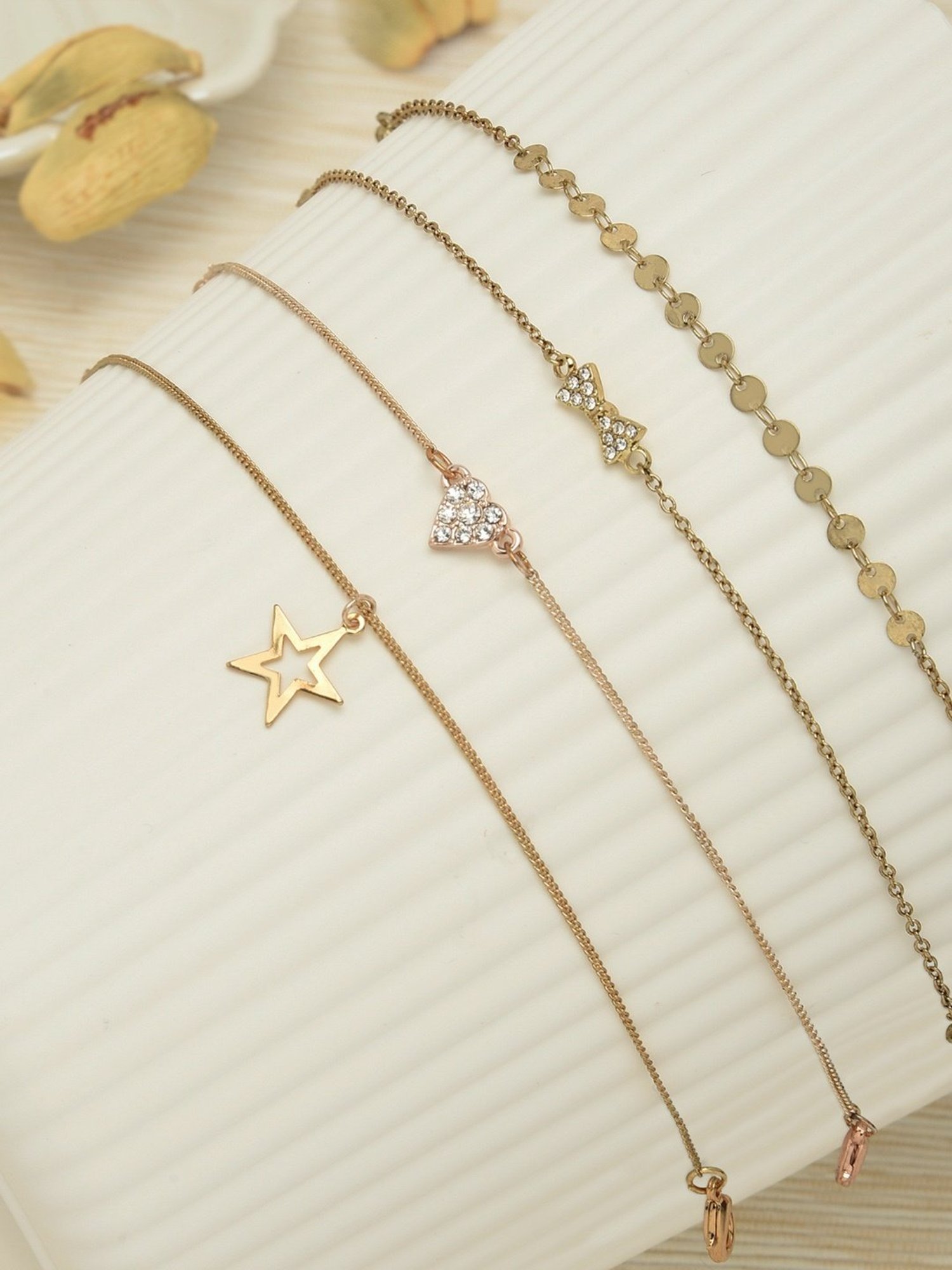 Zaveri Pearls Set Of 4 Gold & Rose Gold Contemporary Bracelets-ZPFK10543